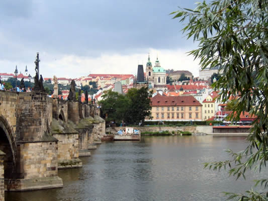and the Vltava River flows on
