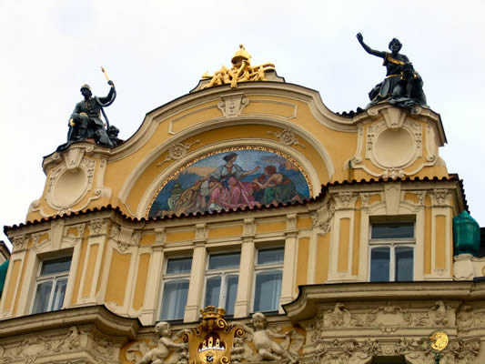 Firefighter statues on building